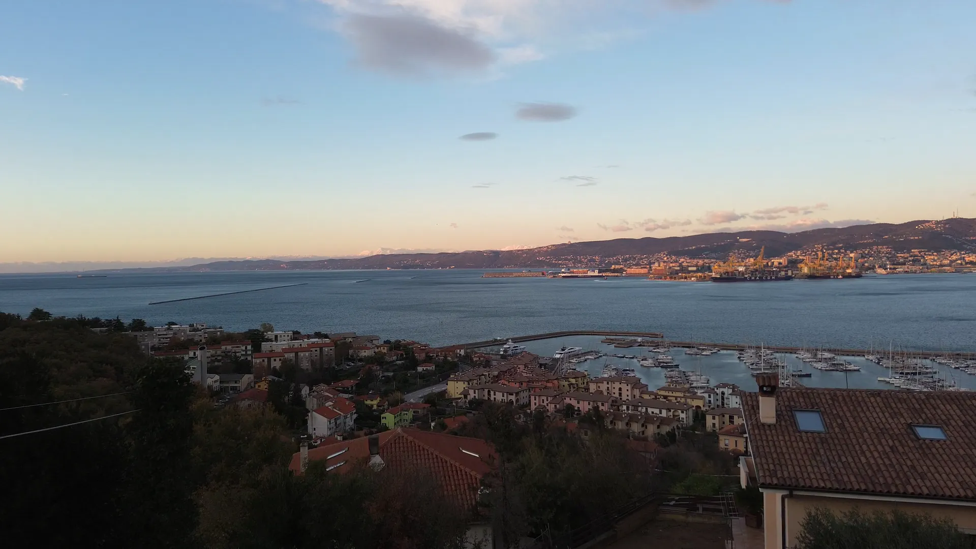 Single-Level Villa with Sea-View Garden — Fontanella, Muggia — Dusk, from the garden.